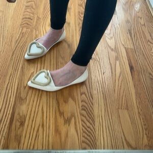 Melissa size 6 cream ballet flats with oversized heart. Super cute!